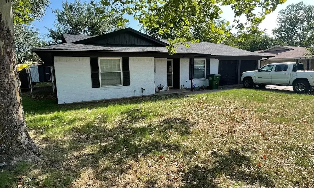 Professional roofing crew working on a residential roof in Barnesville